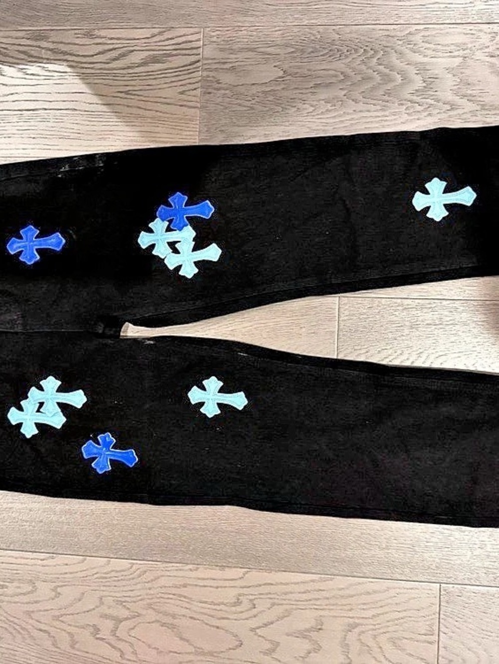 Chrome hearts jeans with blue crosses